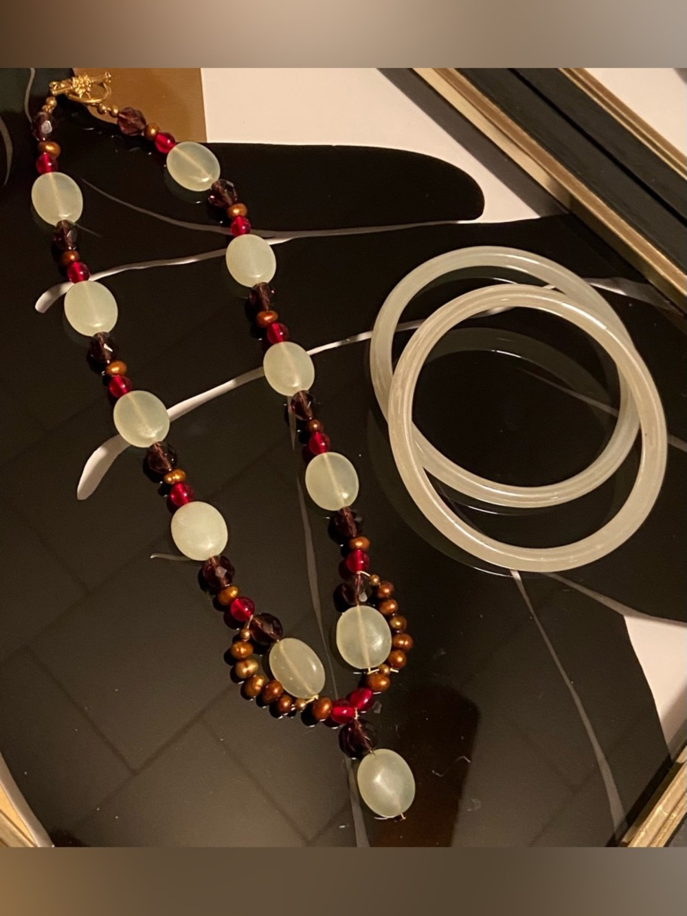2 White Jade Bangle Bracelets and a Jade, Garnet, and Pearl Beaded Necklace